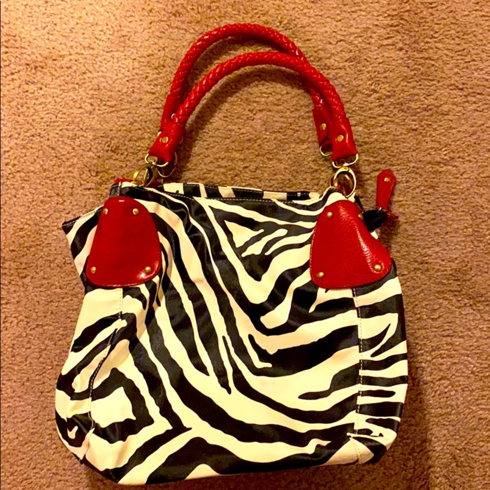 Leather Zebra Print Purse With a Pop of Red.